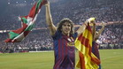 COP141 MADRID, 25/05/2012.- El jugador del FC Barcelona Carles Puyol celebra su victoria en la final de la Copa del Rey al imponerse al Athletic Club, esta noche en el estadio Vicente Caldern de Madrid. EFE/Emilio Naranjo