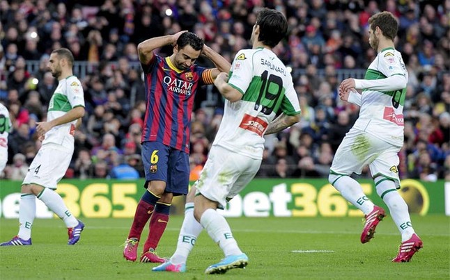 Xavi se lamenta tras fallar el penalti | Foto: AFP