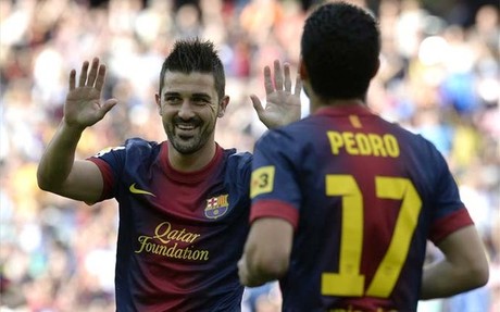 Villa y Pedro celebran el primer gol del Barça ante el Málaga